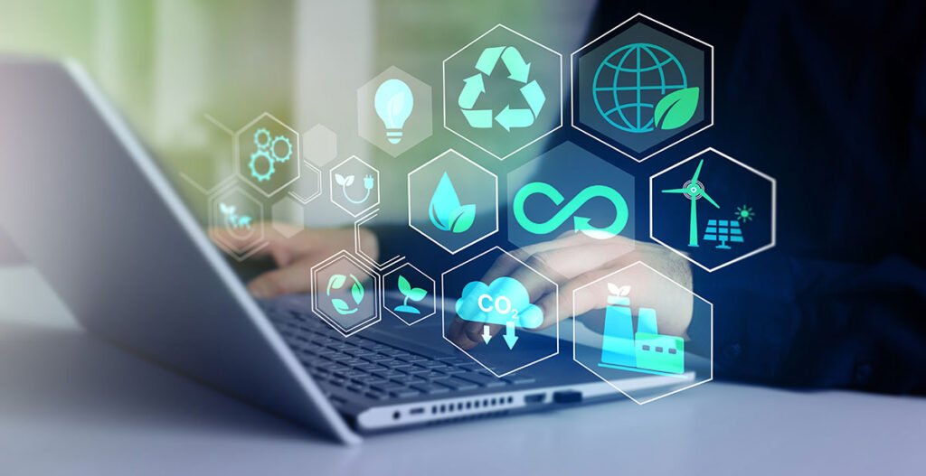 business man working on laptop with environmental icons